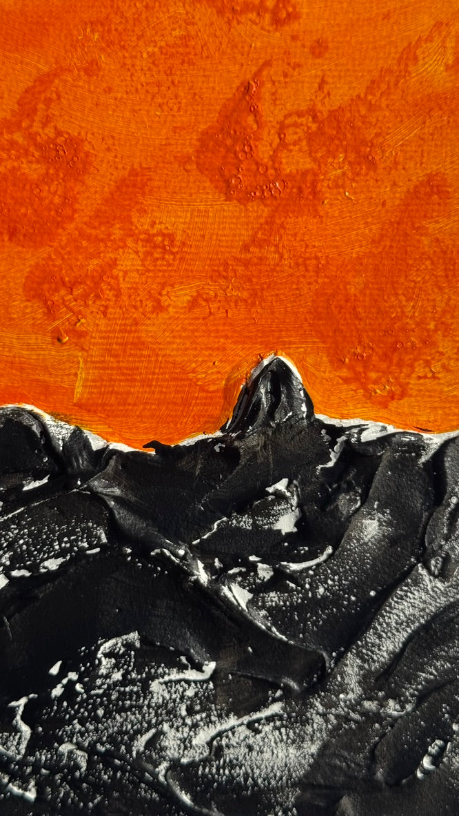 Dark sea under a hot sky