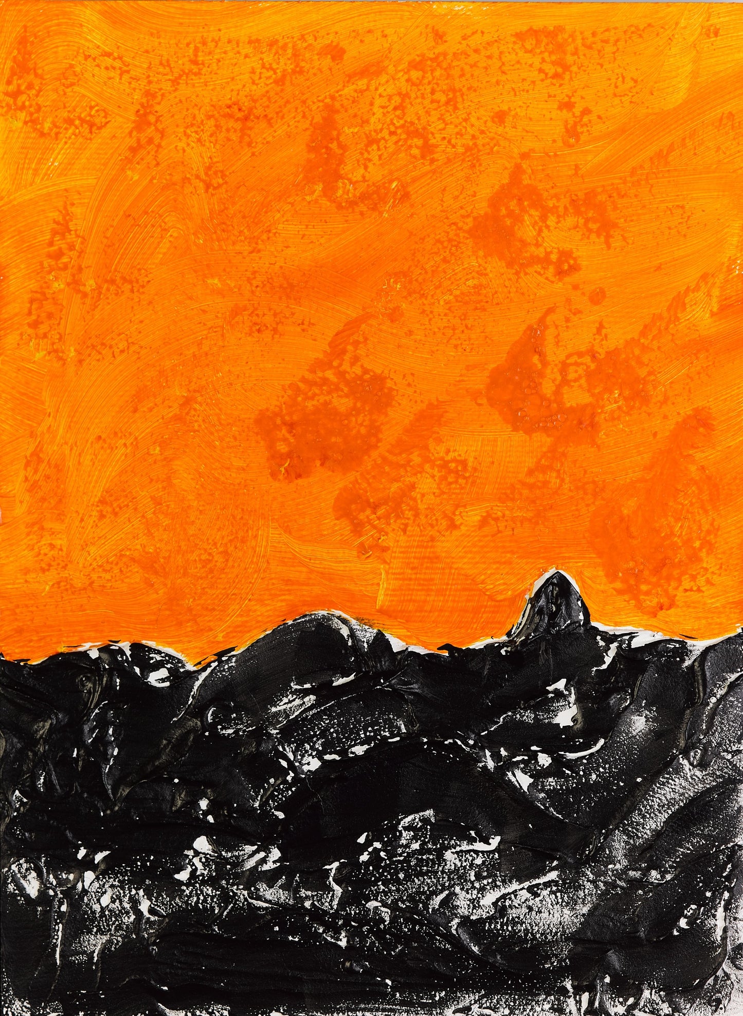 Dark sea under a hot sky